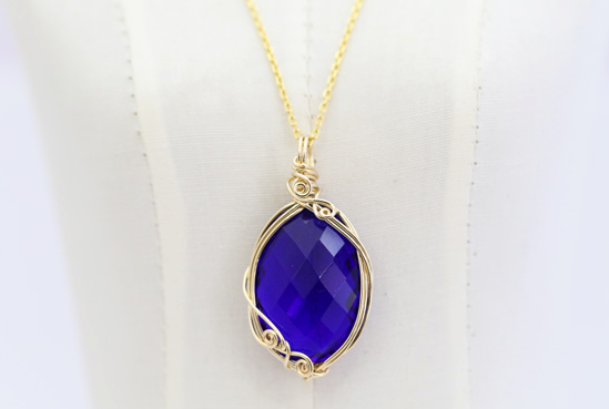 Pendentif "Tanzanite Fire" en cristal Sierra Nevada Andara, or K14