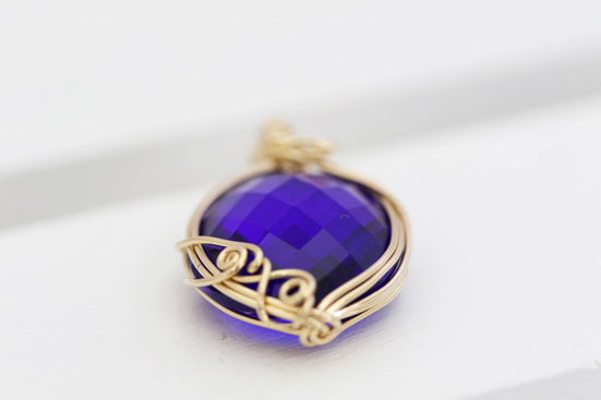 Pendentif "Tanzanite Fire" en cristal Sierra Nevada Andara, or K14