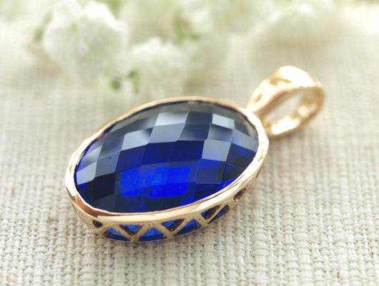 Sierra Nevada Andara Crystal "Tanzanite Fire" pendant, K18 YG